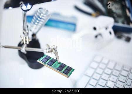 Microchip, technology and engineering with computer maintenance and IT, motherboard and circuit board. Tech support, repair drive and semiconductor Stock Photo