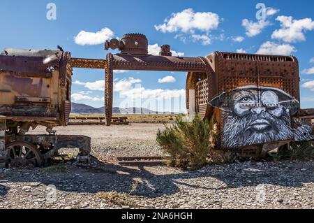 Graffiti on an abandoned tank car in the Train Graveyard of Uyuni; Uyuni, Potosi Department, Bolivia Stock Photo