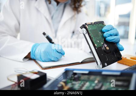 Hands, technician and motherboard from computer, laptop or pc in cyber crime investigation, analysis and IT solution. Information technology engineer Stock Photo