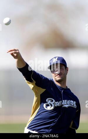 FILE ** Milwaukee Brewers' Ryan Braun can't make a catch at the wall at  baseball spring training in this, Feb. 21, 2008 file photo, in Phoenix. The  24-year old Braun is