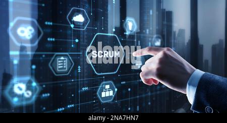 Businessman presses a button Scrum process software development outline concept Stock Photo