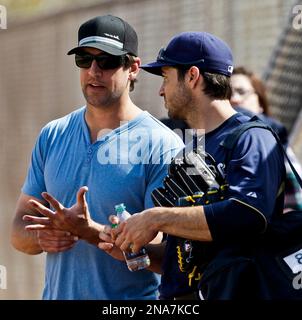 FILE ** Milwaukee Brewers' Ryan Braun can't make a catch at the wall at  baseball spring training in this, Feb. 21, 2008 file photo, in Phoenix. The  24-year old Braun is