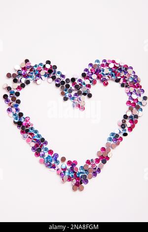 Rhinestone fashion background. Heart shape Stock Photo