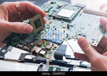 Installation of processor in CPU socket Stock Photo