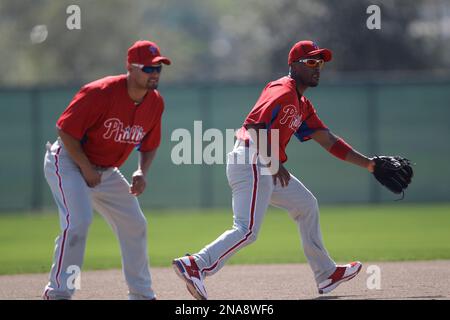Philadelphia Phillies' Jimmy Rollins, right, is congratulated by manager  Larry Bowas after his game-winning RBI single against the Atlanta Braves in  the ninth inning, Thursday, June 19, 2003, in Philadelphia. Between them