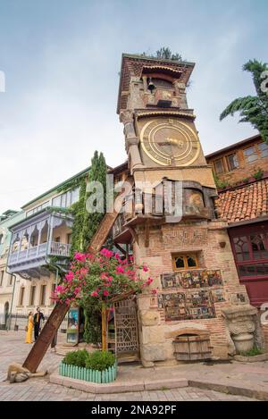 The leaning clock tower built by Georgian puppeteer Rezo Gabriadze is located in old town Tbilisi, Georgia; Tbilisi, Georgia Stock Photo