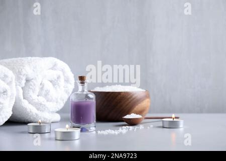 Composition with different spa items on grey table, space for text Stock Photo