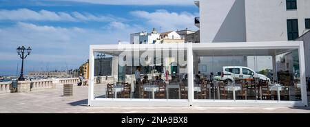 Modern restaurant on the waterfront in Otranto, Lecce, Italy; Lecce, Basilicata, Italy Stock Photo
