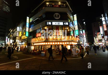 The vibrant small alleys in Nishishinjuku with many Bars, Clubs and restaurants. Shinjuku, Tokyo, Japan. Stock Photo