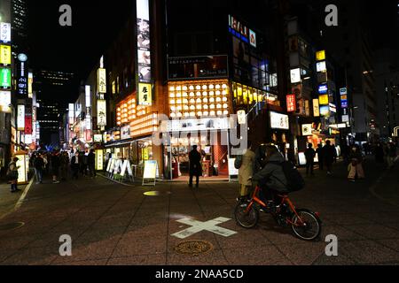 The vibrant small alleys in Nishishinjuku with many Bars, Clubs and restaurants. Shinjuku, Tokyo, Japan. Stock Photo