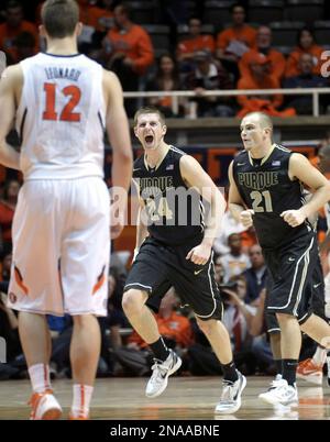 Purdue guard Ryne Smith (24) congratulates teammate Lewis Jackson, right,  during the second half against St. Peter's in the second round of the 2011  NCAA Men's Basketball Championship at the United Center
