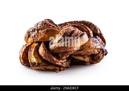 Tasty, sweet cinnamon bun on a stainless isolated on white background. Stock Photo