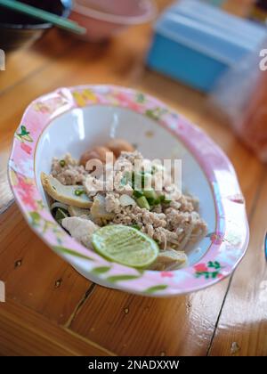 Tom Yum noodle soup with Minced Pork and meatball.popular hot and spicy soup in Thailand Stock Photo