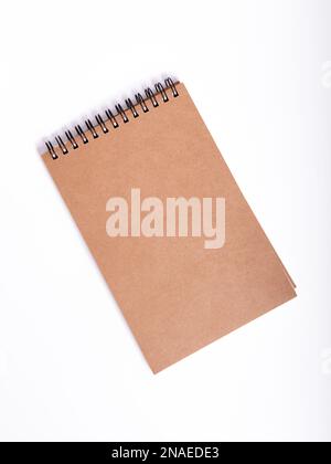 small notebook on a white isolated background Stock Photo