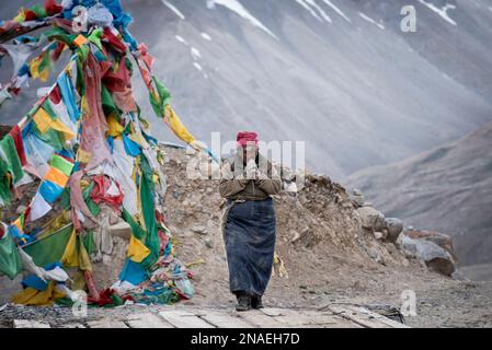 Pilgrim starting on the Kora pilgrimage at Mount Kailash; Tibetan Autonomous Region, Tibet Stock Photo