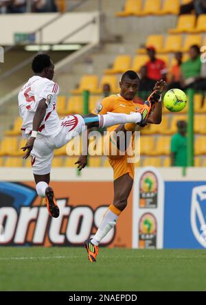 Ivory Coast's Salomon Kalou, Right, Is Challenged By Ghana's Michael ...