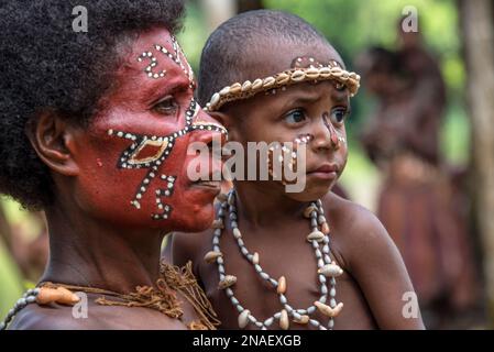 Woman and child living along the Karawari River in the Sepik area of Papua New Guinea. Stock Photo