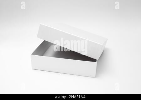 White textured opened box, gift mockup on white background.High resolution photo. Blank White Product Package Box Mock-up. Container, Packaging Templa Stock Photo