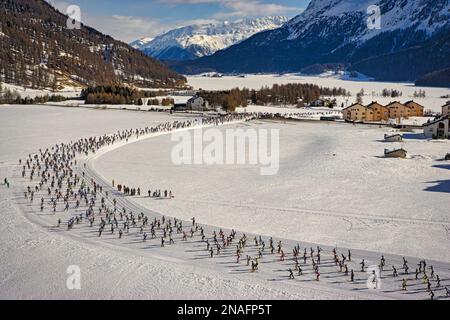 Aerial view of some of the 16,000 participants in the Ski Marathon as Nordic skiers trek across frozen upper Engadine valley. The winter event has ... Stock Photo