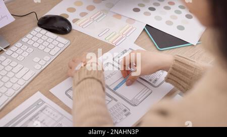 Phone, app and planning with the hands of a woman in business working on software development in her office. Design, creative and strategy with a Stock Photo