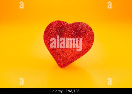 heart shape on the yellow background Stock Photo