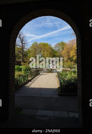 London - 04 11 2022: view of the Dutch garden in Holland park from inside an archway Stock Photo