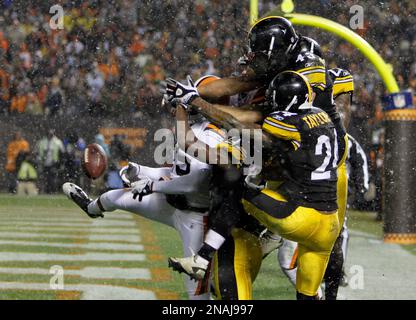 Pittsburgh Steelers running back Greg Bell (38) is stopped by Tampa Bay  Buccaneers safety Kedrick Whitehead, left, during the second half of a  preseason NFL football game, Friday, Aug. 11, 2023, in