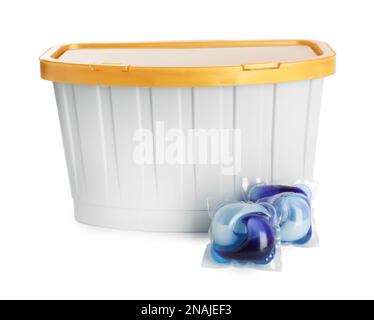 Laundry capsules and box on white background Stock Photo