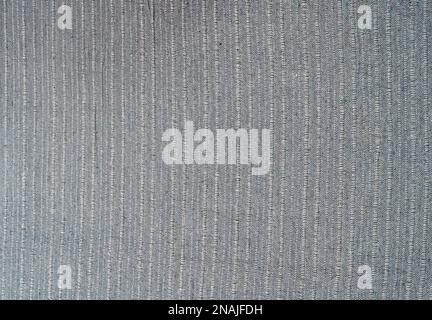 Cotton textile gray material close-up abstract defocused background. Stock Photo
