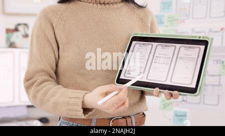 App, developer and woman with hands on tablet design screen for development of ui, ux and tech project. Designer, display and innovation employee in Stock Photo