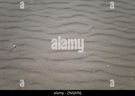 Black and White Background of Lines in the Sand on East Coast Beach Stock Photo