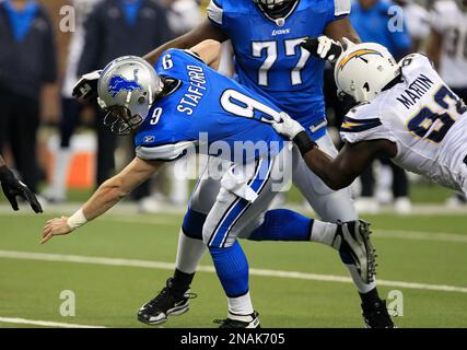 Detroit Lions quarterback Matthew Stafford (9) is sacked by San Diego  Chargers defensive end Vaughn Martin (92) during the first quarter of an  NFL football game in Detroit, Saturday, Dec. 24, 2011. (