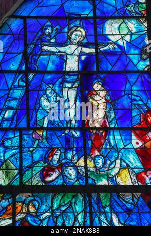 Detail Crucifixion of the stained glass window of La Paix, the Peace, by Marc Chagall, Chapelle des Cordeliers, Franciscan chapel from the 18th Stock Photo