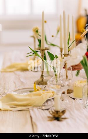 Beautiful table setting with floral decor. Beautiful table setting with floral decor. Stock Photo