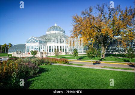 The Marjorie McNeely Conservatory is a historical attraction at Como Park in St. Paul, Minnesota. Stock Photo
