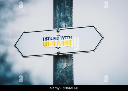 I stand with Ukraine - political statement - badge on trail sign - loyalty pro Ukraine against war - no retreat no surrender Stock Photo