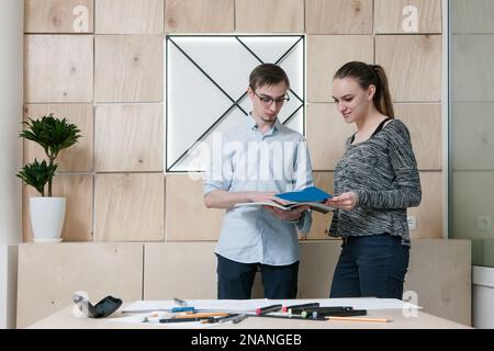 Designers discussing at office Stock Photo