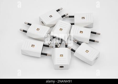 white power plugs on white background Stock Photo