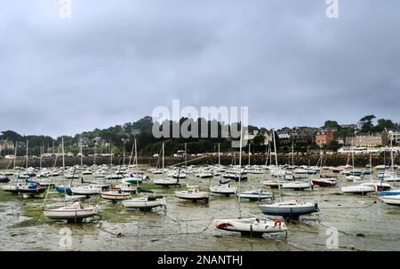 View of the harbor at low tide in the French town of Saint Quay Portrieux with stranded ships. Stock Photo