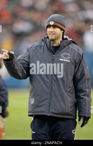 Chicago Bears linebacker Brian Urlacher (54) and quarterback Jay Cutler (6)  stand on the sidelines during