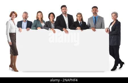 Business people group with blank banner isolated over white, smiling successful people Stock Photo
