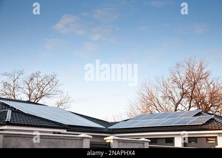 Picture of a solar panel on a roof of a residential building in serbia. The term solar panel is used colloquially for a photo-voltaic (PV) module. A P Stock Photo