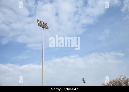 Picture of stadium floodlights on display in the afternoon, they are used to lit a stadium at night. Stock Photo