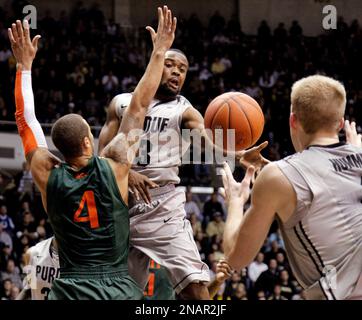 Purdue guard Ryne Smith (24) congratulates teammate Lewis Jackson, right,  during the second half against St. Peter's in the second round of the 2011  NCAA Men's Basketball Championship at the United Center