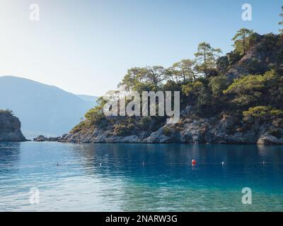 Oludeniz beach is Blue Flag coast is best beaches in Turkey, Fethiye Mugla province. autumn vibe without people. Stock Photo