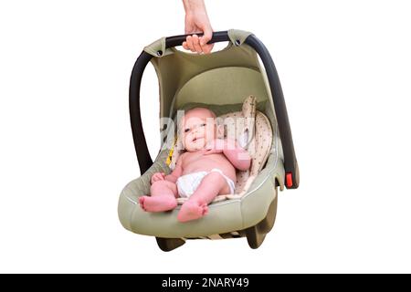 Woman mother carries baby in infant car seat in clinic, isolated on a white background. Kid aged two months Stock Photo