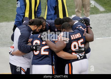 Chicago Bears players gather on the field before an NFL football game  against the Seattle Seahawks in Chicago, Sunday, Dec. 18, 2011. (AP  Photo/Kiichiro Sato Stock Photo - Alamy