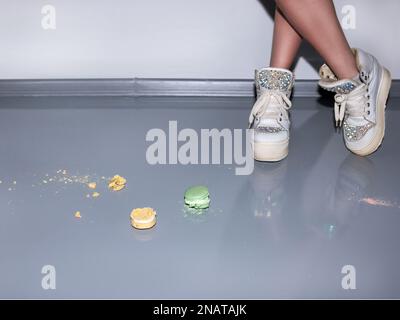 Crumbs of macarons on the floor Stock Photo