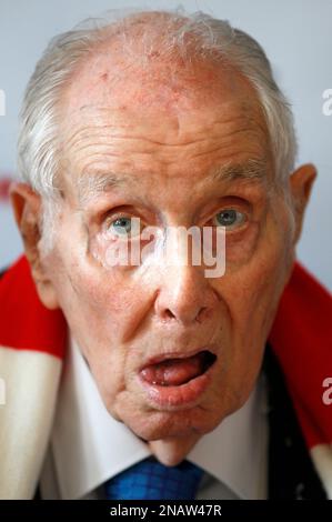 Ronnie Biggs, one of Britain's most notorious criminals, holds a copy ...