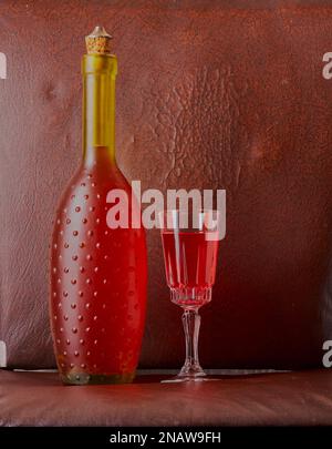 Cosmetic tubs with a water splash over them on a green gradient background. Stock Photo